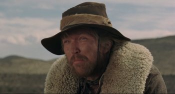 Movie still from “Buck and the Preacher” (1972), directed by Joseph Sargent – A person wearing a hat; Close Up shot, Low angle