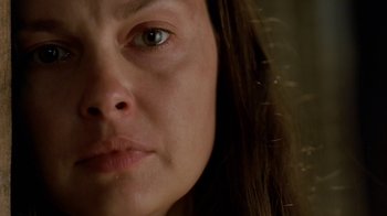 Movie still from “Bug” (2006), directed by William Friedkin – A woman's eyes and face; Close Up shot, High angle