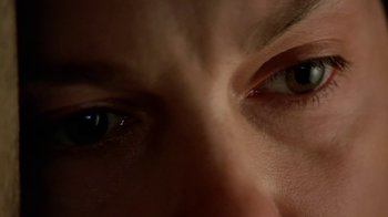 Movie still from “Bug” (2006), directed by William Friedkin – View of a person's eyes; Extreme Close Up shot, Overhead angle