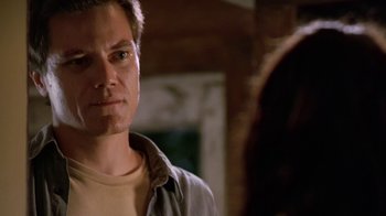 Movie still from “Bug” (2006), directed by William Friedkin – A man standing in front of a mirror; Close Up shot, Over the shoulder angle