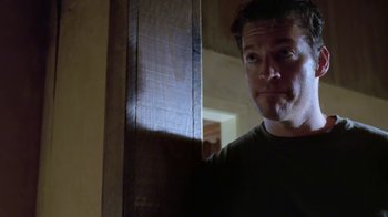 Movie still from “Bug” (2006), directed by William Friedkin – A person standing in a room; Close Up shot, Low angle