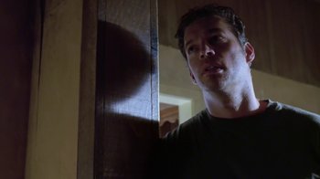 Movie still from “Bug” (2006), directed by William Friedkin – A person standing in a room; Close Up shot, Low angle