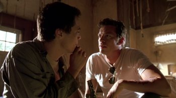 Movie still from “Bug” (2006), directed by William Friedkin – Two men are talking in a dimly - lit room; Close Up shot, Over the shoulder angle