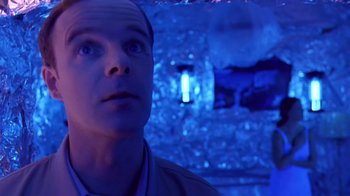 Movie still from “Bug” (2006), directed by William Friedkin – A person looking up at the sky; Close Up shot, Low angle