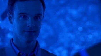 Movie still from “Bug” (2006), directed by William Friedkin – A person wearing a shirt and tie; Close Up shot, Over the shoulder angle