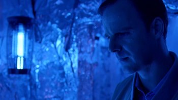 Movie still from “Bug” (2006), directed by William Friedkin – A person looking at the camera; Close Up shot, Low angle