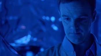 Movie still from “Bug” (2006), directed by William Friedkin – A person wearing a white shirt; Close Up shot, Over the shoulder angle