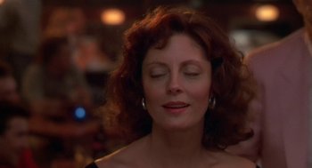 Movie still from “Bull Durham” (1988), directed by Ron Shelton – A person with eyes closed; Close Up shot, Low angle