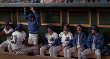 Movie still from “Bull Durham” (1988), directed by Ron Shelton – A group of baseball players sitting in a dugout; Wide shot, High angle