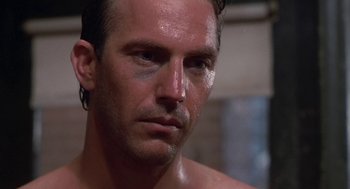 Movie still from “Bull Durham” (1988), directed by Ron Shelton – A person with wet skin; Close Up shot, Over the shoulder angle