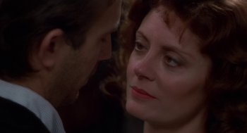 Movie still from “Bull Durham” (1988), directed by Ron Shelton – A man and a woman face to face in front of a wall; Close Up shot, Over the shoulder angle