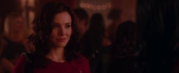 A person wearing a red sweater