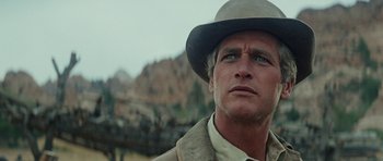 Movie still from “Butch Cassidy and the Sundance Kid” (1969), directed by George Roy Hill – A person wearing a hat; Close Up shot, Low angle