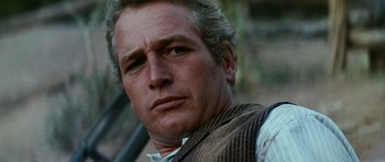 Movie still from “Butch Cassidy and the Sundance Kid” (1969), directed by George Roy Hill – A person wearing a vest; Close Up shot, Low angle