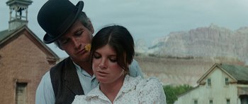 Movie still from “Butch Cassidy and the Sundance Kid” (1969), directed by George Roy Hill – A man and a woman standing next to each other; Close Up shot, Low angle