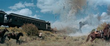 Movie still from “Butch Cassidy and the Sundance Kid” (1969), directed by George Roy Hill – A train on the tracks in the middle of a field; Extreme Wide shot, Low angle