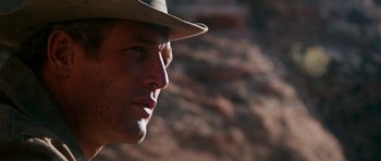 Movie still from “Butch Cassidy and the Sundance Kid” (1969), directed by George Roy Hill – A person wearing a hat; Close Up shot, Low angle