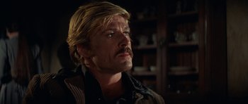 Movie still from “Butch Cassidy and the Sundance Kid” (1969), directed by George Roy Hill – A person with a beard; Close Up shot, Low angle
