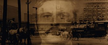 Movie still from “Butch Cassidy and the Sundance Kid” (1969), directed by George Roy Hill – An old photo of a woman's face and a horse and carriage; Extreme Close Up shot, Low angle
