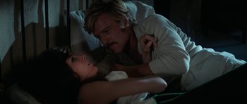 Movie still from “Butch Cassidy and the Sundance Kid” (1969), directed by George Roy Hill – A man and a woman laying in a bed together; Close Up shot, Over the shoulder angle