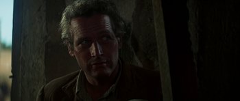 Movie still from “Butch Cassidy and the Sundance Kid” (1969), directed by George Roy Hill – A person wearing a brown shirt; Close Up shot, Low angle