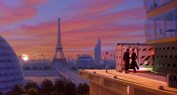 Movie still from “CQ” (2001), directed by Roman Coppola – A group of people standing on top of a building near the eiffel tower; Extreme Wide shot, Low angle