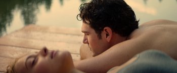 Movie still from “Cabin Fever” (2016), directed by Travis Zariwny – A person laying on the ground; Close Up shot, High angle