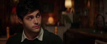 Movie still from “Cabin Fever” (2016), directed by Travis Zariwny – A man sitting in front of a lamp in a living room; Close Up shot, Over the shoulder angle