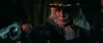 Movie still from “Cabin Fever” (2016), directed by Travis Zariwny – A person wearing a hat; Close Up shot, Over the shoulder angle