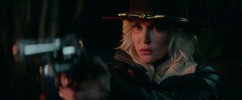 Movie still from “Cabin Fever” (2016), directed by Travis Zariwny – A person with a gun; Close Up shot, Over the shoulder angle