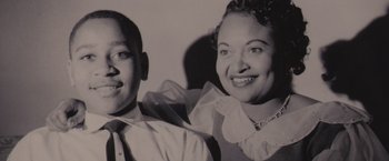 An old black and white photo of a man and a woman