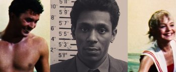 Black and white photograph of a man in a suit and tie
