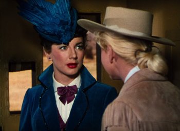 Movie still from “Calamity Jane” (1953), directed by David Butler – A woman wearing a blue jacket and a blue hat; Close Up shot, Over the shoulder angle