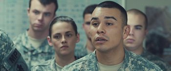 Movie still from “Camp X-Ray” (2014), directed by Peter Sattler – A group of soldiers standing next to each other; Close Up shot, Over the shoulder angle