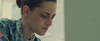 Movie still from “Camp X-Ray” (2014), directed by Peter Sattler – A woman's face looking down; Close Up shot, Low angle