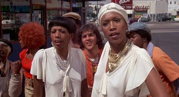 Movie still from “Car Wash” (1976), directed by Michael Schultz – A group of women standing next to each other; Close Up shot, Low angle