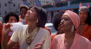 Movie still from “Car Wash” (1976), directed by Michael Schultz – A group of women standing next to each other; Close Up shot, Low angle