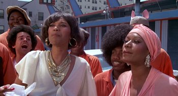Movie still from “Car Wash” (1976), directed by Michael Schultz – A group of women standing next to each other; Close Up shot, Low angle