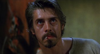 Movie still from “Caravaggio” (1986), directed by Derek Jarman – A person with a beard; Close Up shot, Low angle