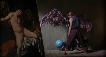 Movie still from “Caravaggio” (1986), directed by Derek Jarman – A person in a room with an object in the background; Wide shot, Overhead angle