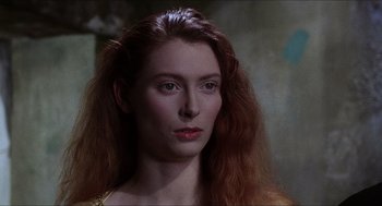 Movie still from “Caravaggio” (1986), directed by Derek Jarman – A person with long red hair; Close Up shot, Over the shoulder angle