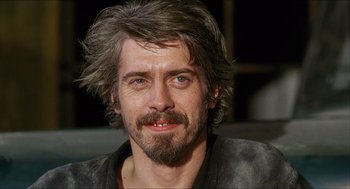 Movie still from “Caravaggio” (1986), directed by Derek Jarman – A person with a beard; Close Up shot, Low angle