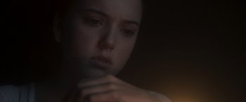 Movie still from “Carmilla” (2019), directed by Emily Harris – A person holding their hands together; Close Up shot, Over the shoulder angle