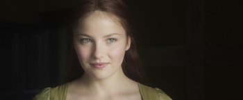 Movie still from “Carmilla” (2019), directed by Emily Harris – A woman's face with green eyes; Close Up shot, Low angle