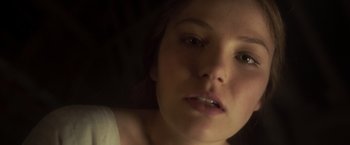 Movie still from “Carmilla” (2019), directed by Emily Harris – A woman's face in the dark; Close Up shot, Overhead angle