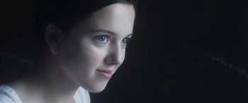 Movie still from “Carmilla” (2019), directed by Emily Harris – A person with blue eyes; Close Up shot, Over the shoulder angle