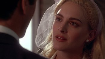 Movie still from “Cast a Deadly Spell” (1991), directed by Martin Campbell – A person wearing a veil; Close Up shot, Over the shoulder angle