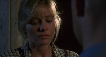 Movie still from “Castle Freak” (1995), directed by Stuart Gordon – A person with her eyes closed; Close Up shot, Over the shoulder angle