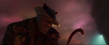 Movie still from “Cats” (2019), directed by Tom Hooper – A man with a hat and a cat on his head; Close Up shot, Low angle