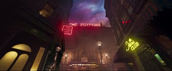 Movie still from “Cats” (2019), directed by Tom Hooper – The egyptian theatre is lit up at night; Extreme Wide shot, Low angle